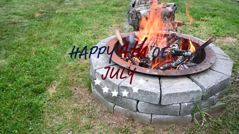 Fireplace burning during 4th of July text Stock Footage 182222600