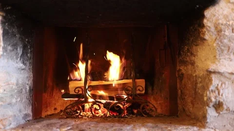 Fireplace burning in a mountain house. 스톡 동영상 296046370