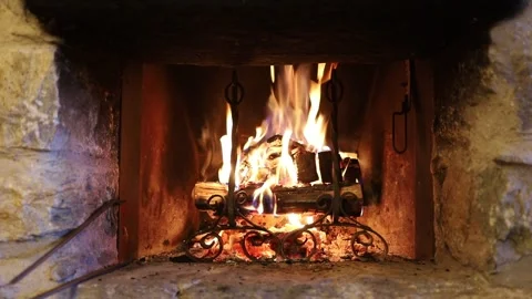 Fireplace burning in a mountain house. Stock Footage 296046371