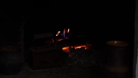 Fireplace burning. Warm cozy burning fire in a brick fireplace close up. Stock Footage 107578897