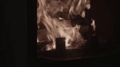 In the fireplace burns a fire Stock Footage 74244624