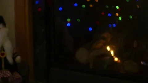 Fireplace with Christmas Lights Reflection Stock Footage 75252035