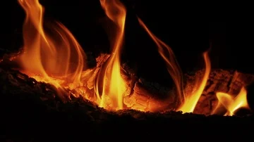 Fireplace. Fire. Bonfire burning at night. Fire burning brightly, heat, light Stock Footage 86089145