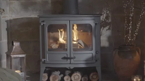 A fireplace with a fire burning in it Video stock 302472002
