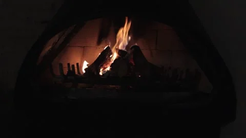 Fireplace. The fire is burning. Warmth and comfort in the country house. Video stock 151461506