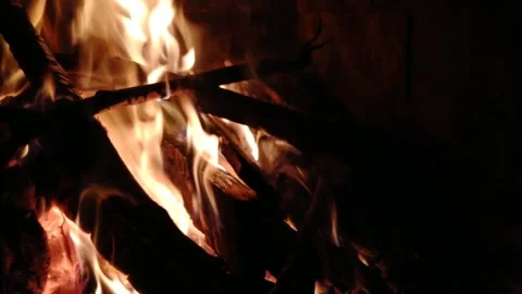 Fireplace with fire for a cozy evening. Stock Footage 220557029