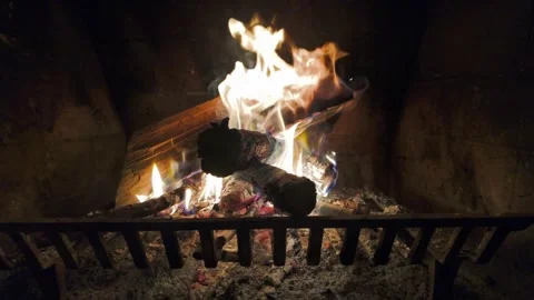Fireplace fire flame for Holiday winter season - 4K Cinematic slow motion Stock Footage 293955488