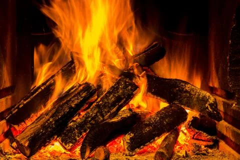 Fireplace with fire Stock Photos