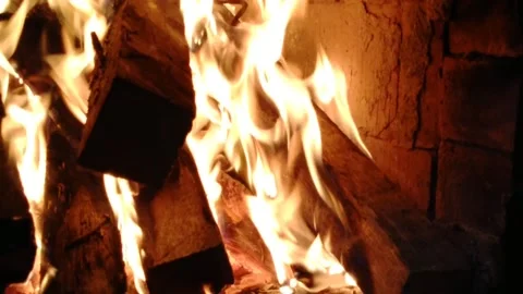 Fireplace with fire. Wood heating Stock Footage 220557074