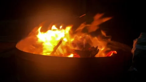 FIREPLACE FLAME BURN SLOW MO ON A BARREL 4K FOOTAGE Video stock 269902897