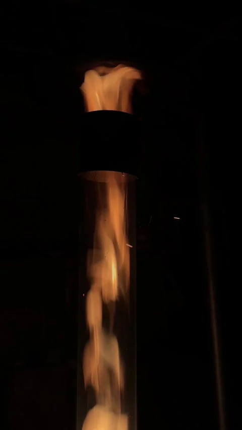 Fireplace Flame Burning Inside Glass Tube Dark Background Close-Up Footage Stock Footage 335167400