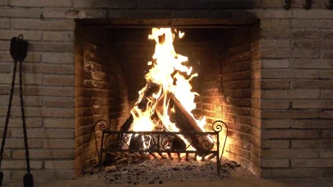 Fireplace flames wood fire burning and old charred bricks slow motion Stock Footage 252083295