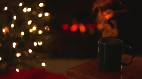 Fireplace with Hot Coco Mug with Orange Steam Stock Footage 50089348