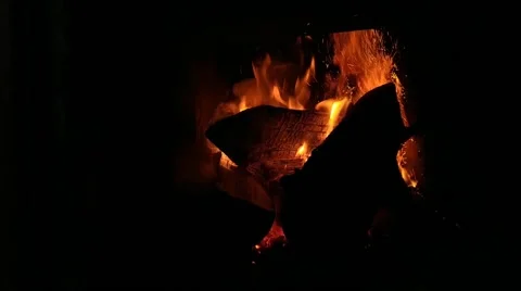 The fireplace is lit for warmth in the house Stock Footage 225067272