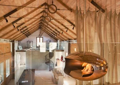 Fireplace in loft of home showcase interior Stock Photos