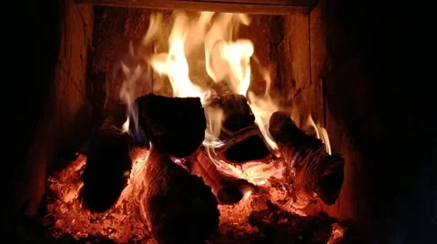 Fireplace made of stone in a house with burning wood. Stock Footage 191927072