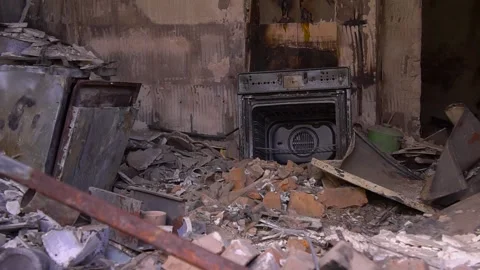 A fireplace is surrounded by rubble in a building event Stock Footage 264322983