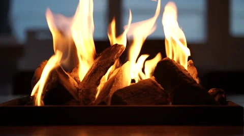 Fireplace on a table at a beachclub - Medium Stock Footage 56268768
