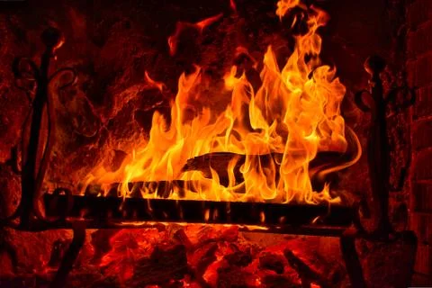 Fireplace whit burning fire Stock Photos