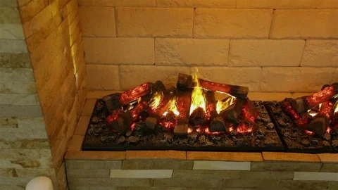 Fireplace with wood in interiors. Simulated fire Stock Footage