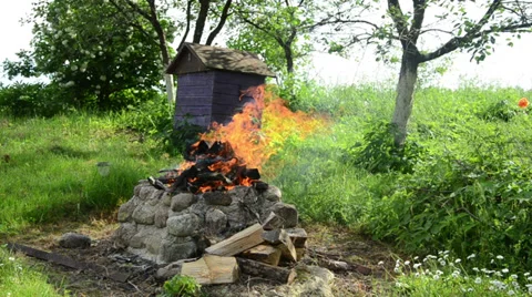 Fireplaces ease burn a pile of dry branches Stock Footage 33400150