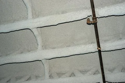 Fireproof asbestos insulation in a South Florida Building. Stock Photos