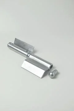 A fireproof iron hinge made in Indonesia with a white background Fotos de archivo