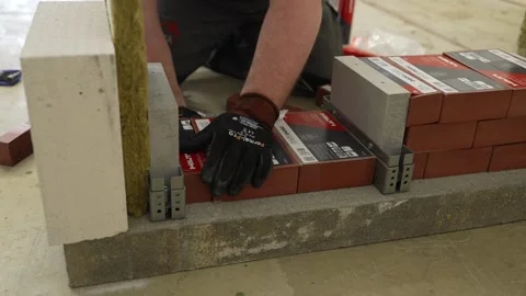Firestop bricks prevent flame spread through wall openings. Essential passive Stock Footage 334741826