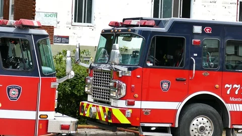 Firetruck and firefighters daylight Stock Footage 114805553