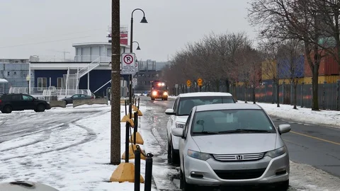 Firetruck passing with lights on during winter at port Stock Footage 103132095