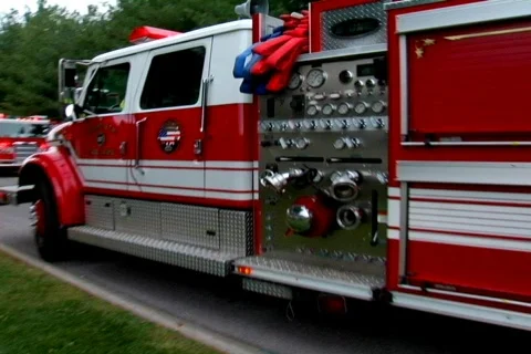 Firetruck Pulling Up at a Massive Fire Stock Footage 373841