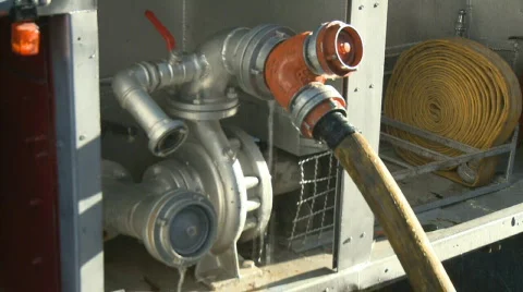 Firetruck pump working em fire Stock Footage 567484