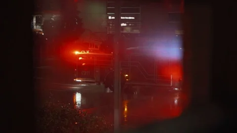 Firetruck Through Window Nightime Raining Stockbeeldmateriaal 104466325