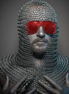 Firewall, man with iron armor and red glasses, concept of protection and comp 스톡 사진