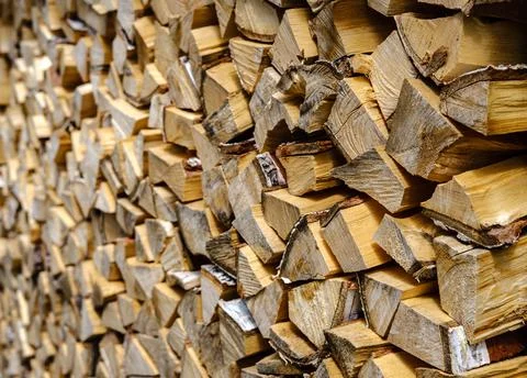 Firewood background with copy space. Stock Photos