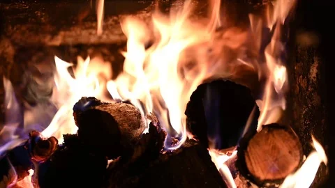 Firewood burning in a fireplace Stock Footage 100747534
