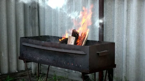 Firewood is burning in the grill Stock Footage 196822091