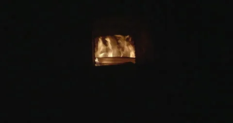 Firewood burning in the oven Stockbeeldmateriaal 243094089