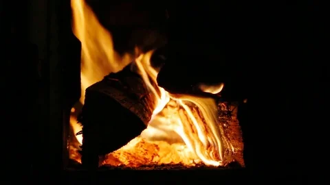 Firewood burning in stove Video stock 79669937