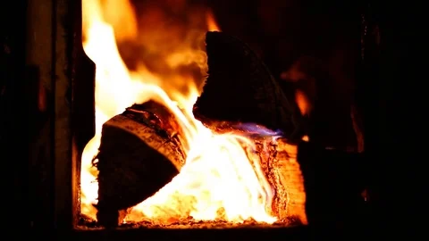 Firewood burning in stove Stock Footage