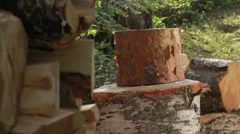 Firewood chopping of a thick pine block Stock Footage 52314937