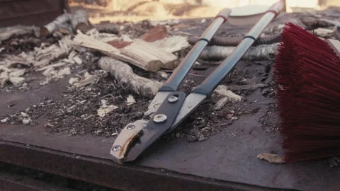 Firewood Cutting Tools with Brush on Rusty Table Video stock 306323963