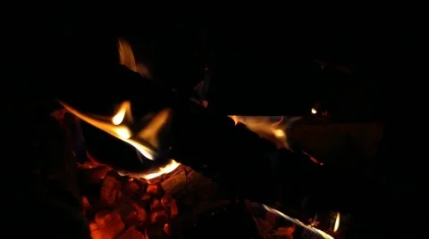 Firewood on fire in the fireplace in the evening Stock Footage 171882111