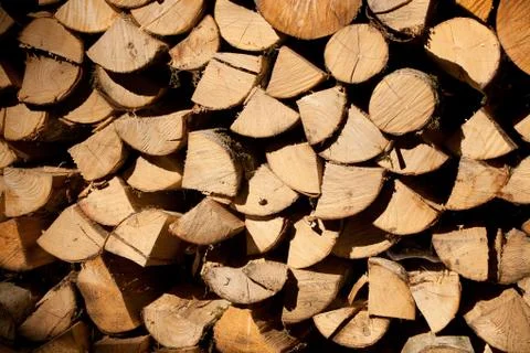 Firewood logs as background pattern Stock Photos