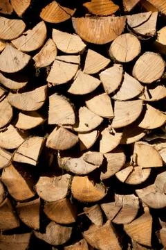 Firewood logs as background pattern Stock Photos