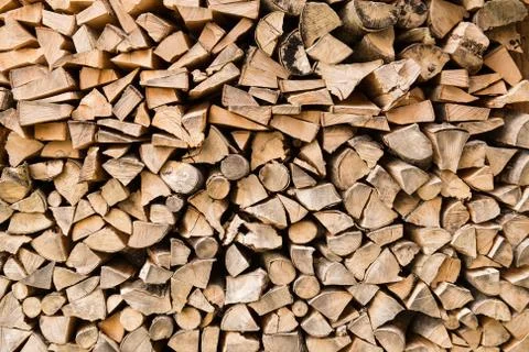 Firewood logs background Stock Photos