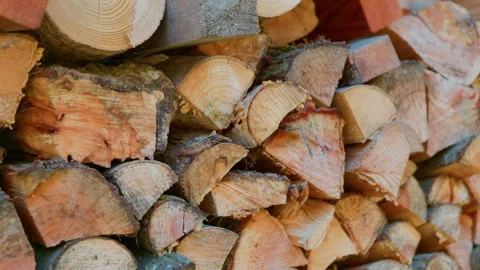 Firewood logs stack timber pile handheld pan right Stock-Footage 346916626