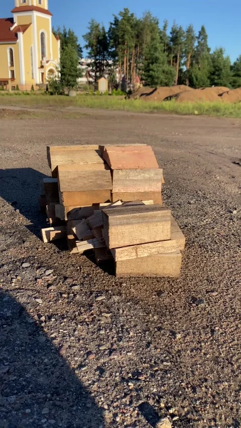 Firewood lying on the ground. Vertical video Video stock 282182174