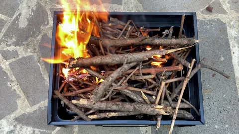 Firewood, small branches in the Grill. Prepare Flame For Roasting Meat. Top view 스톡 동영상 251890156