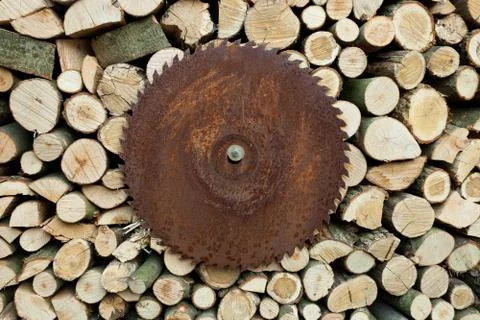 Firewood Stack and buzz saw Stock Photos
